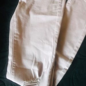 Light pink ripped jeans